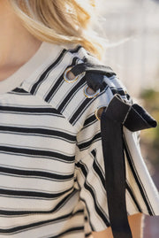 Lace up grommet stripe top