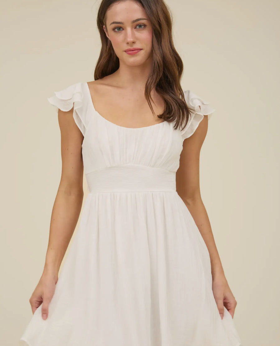 Ruffle sleeve tie back dress